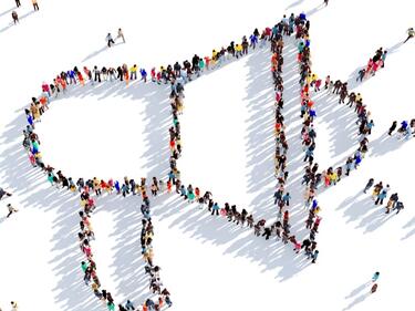 Graphic Birdseye view of megaphone created by small cartoon people